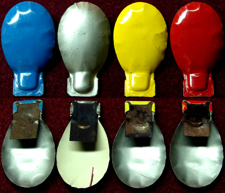 (4) Small Colorful 1930s Cracker Jack Pop Corn Confection Painted Tin Metal Toy Prize Clicker Noisemakers