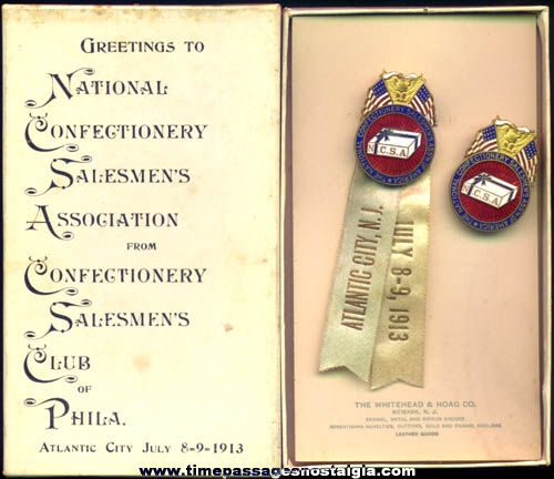 (2) Boxed 1913 Confectionery Salesman Enameled Badges