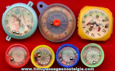 (7) Tiny Dexterity Puzzles And Roulette Wheel Toys