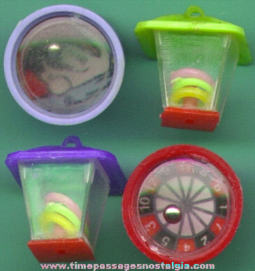 (4) 1960’s Gum Ball Machine Dexterity Game Puzzle Prizes