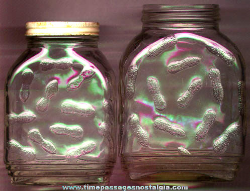 (2) Different Size Old Peanut Embossed Jars