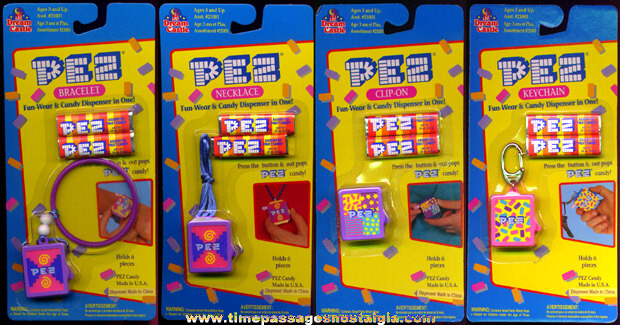 (4) Unopened 1994 PEZ Candy Dispenser Jewelry Items