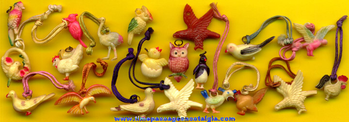 (20) Old Celluloid Bird Charms