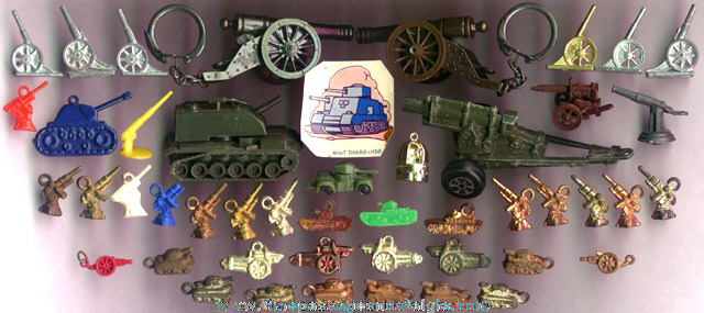 (47) Old Miniature & Charm Cannons And Tanks