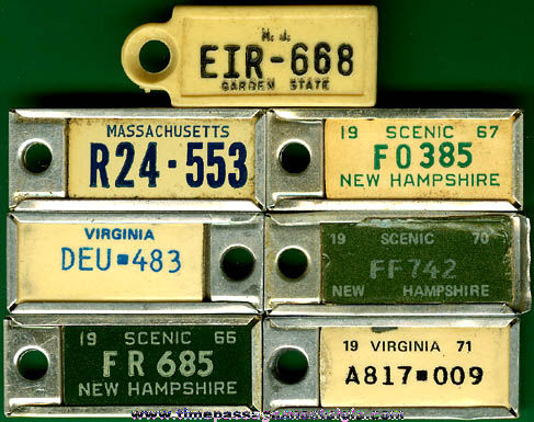 (7) Different Old DAV License Plate Charms