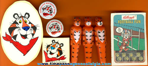 (8) Small Kellogg’s Tony The Tiger Cereal Advertising Character Items