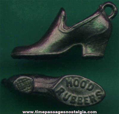 (2) Old Metal Hood Rubbers Advertising Shoe Charms