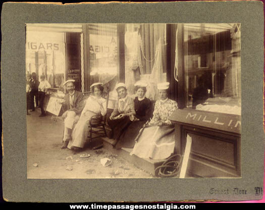 Early Down Town Store Front and People Photograph