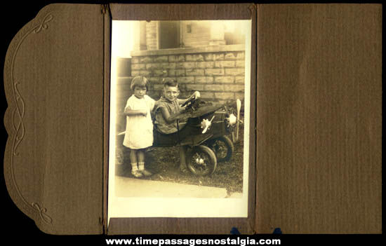 Old Boy & Girl Photograph with a Toy Airplane Pedal Car