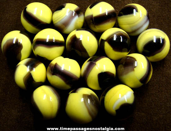(16) Old Machine Made Bumble Bee Glass Marbles