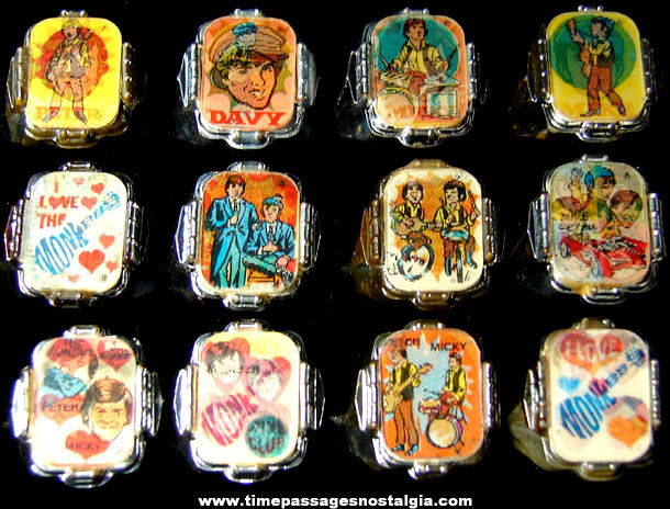 Complete Set of (12) Unused Monkees Gum Ball Machine Prize Flicker Toy Rings
