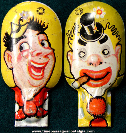 (2) Colorful Old Lithographed Tin Clown Clicker Noisemakers