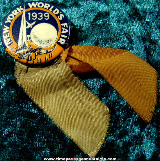 1939 New York World’s Fair Advertising Souvenir Celluloid Pin Back Button With Ribbon