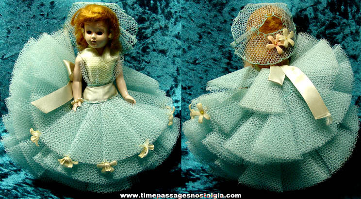 Small Old Toy Doll with a Large Thick Dress