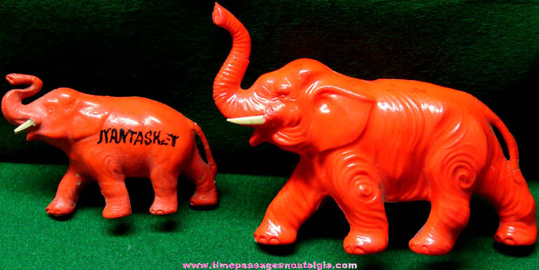 (2) Old Pink Celluloid Souvenir Elephant Figurines