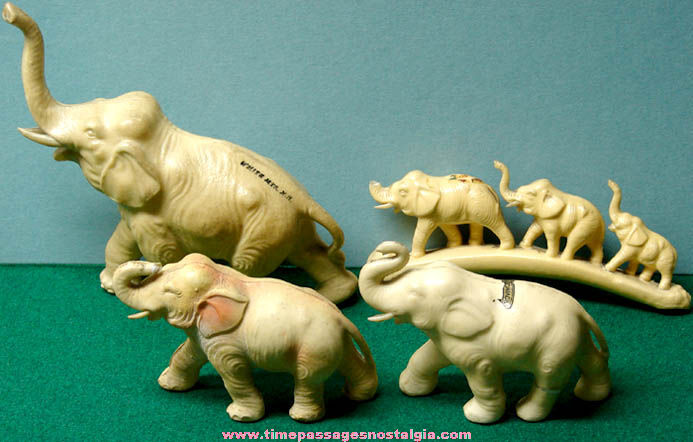(4) Old Celluloid Souvenir Elephant Figurines