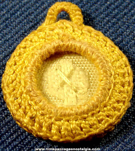 Small Old Unknown Religious Relic in a Crocheted Charm Holder