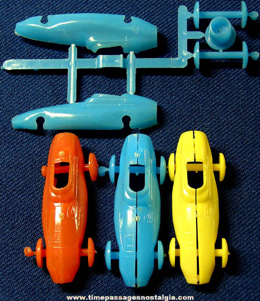 (4) Old Hard Plastic Cereal Prize Miniature Model Kit Race Cars