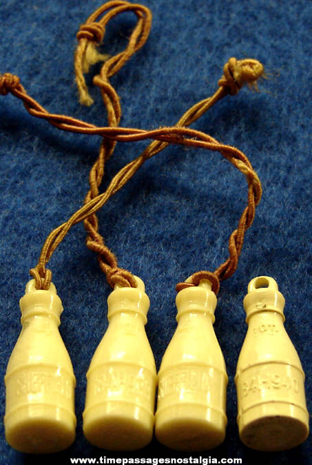 (4) 1939 - 1940 Sheffield Dairy Advertising Milk Bottle Celluloid Charms
