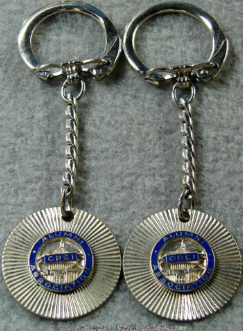 (2) Old Unused Enameled C.R.E.I. Advertising Key Chains