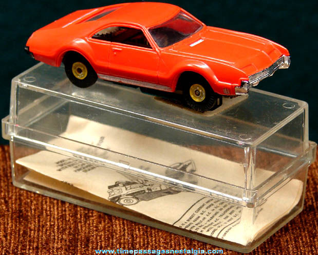 Boxed 1960s Red Oldsmobile Toronado Aurora Slot Car