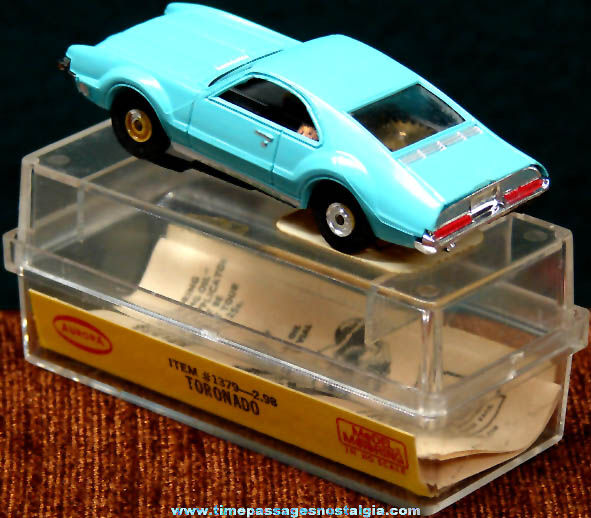 Boxed 1960s Turquoise Blue Oldsmobile Toronado Aurora Slot Car