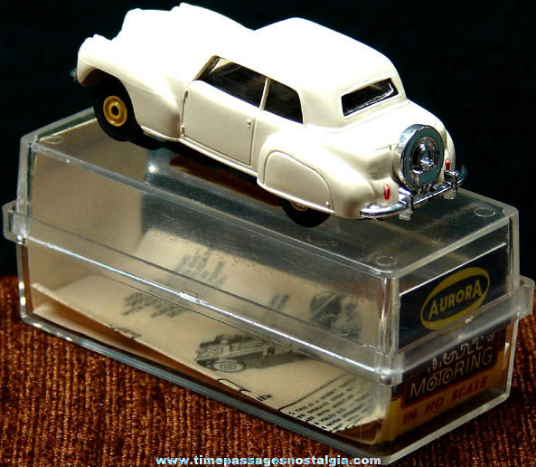Boxed 1960s White Lincoln Continental Aurora Slot Car