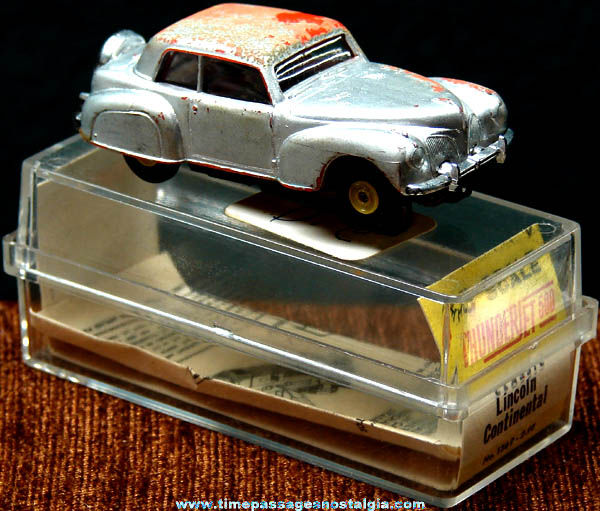 Boxed 1960s Red Lincoln Continental Aurora Slot Car