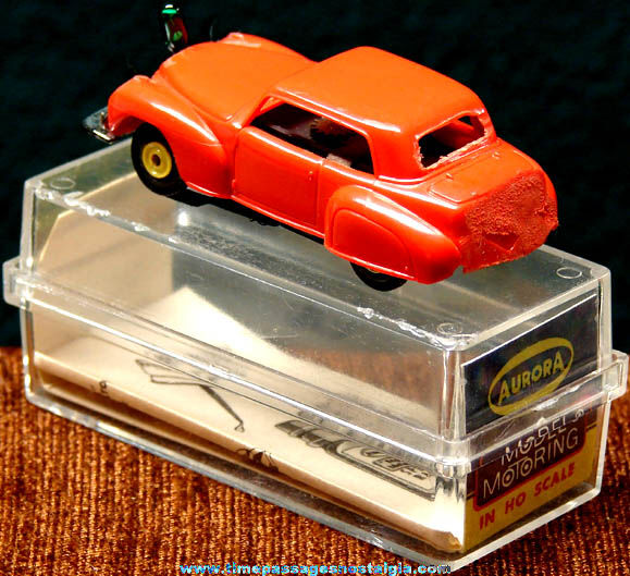Boxed 1960s Red Lincoln Continental Aurora Slot Car