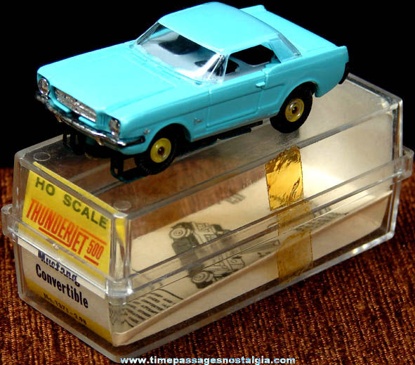 Boxed 1960s Turquoise Blue Ford Mustang Aurora Slot Car