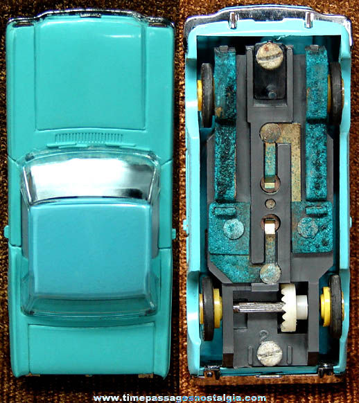 Boxed 1960s Turquoise Blue Ford Mustang Aurora Slot Car