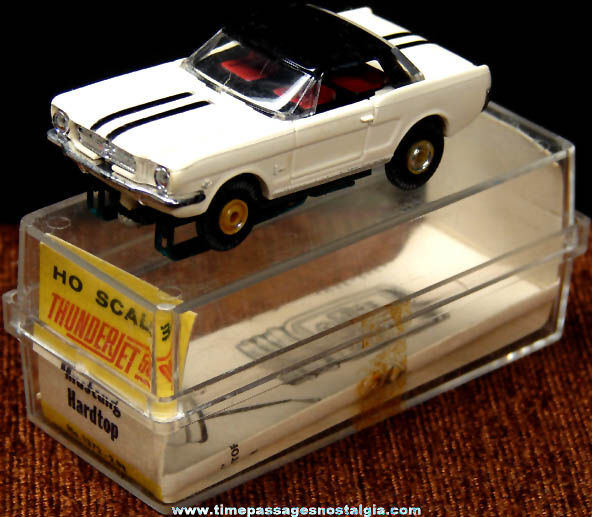 Boxed 1960s Black & White Ford Mustang Aurora Slot Car