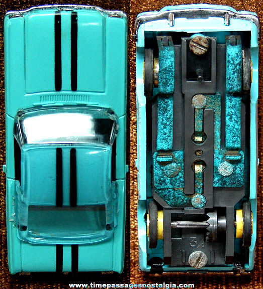 Boxed 1960s Turquoise Blue Ford Mustang Fastback Aurora Slot Car