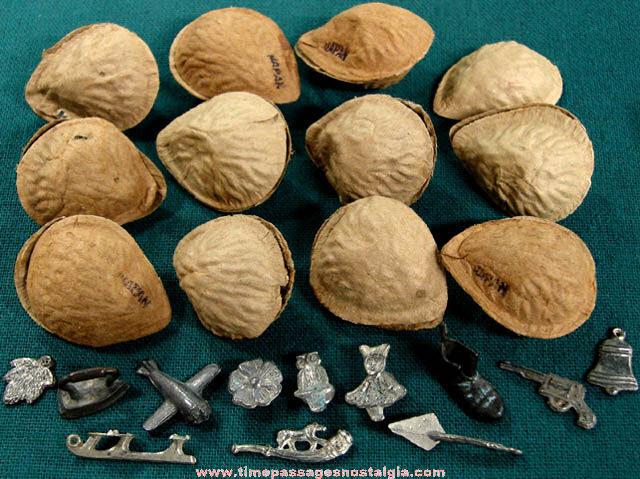 (12) Old Paper Nut Shells With Novelty Lead Toy Prizes