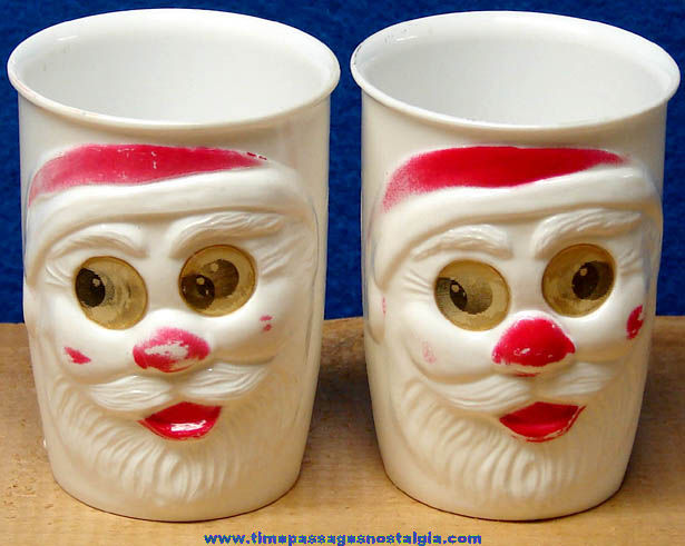 (2) Old Hard Plastic Santa Claus Drink Cups With Moving Flicker Eyes