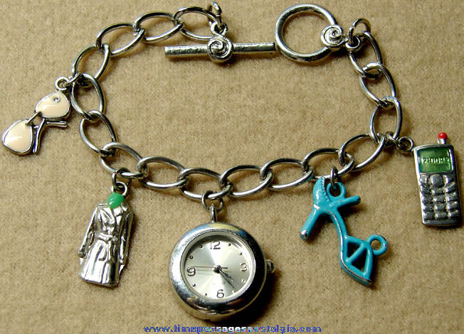 Ladies Metal Charm Bracelet With Watch