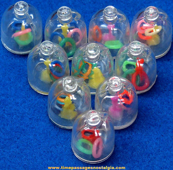(10) Old Gum Ball Machine Prize Ring Toss Puzzle Toy Charms