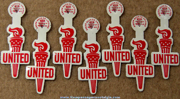 (7) Old Unused United Advertising Torch Tin Tab Buttons
