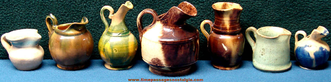 (7) Different Old Miniature Fired Clay Pottery Pitchers