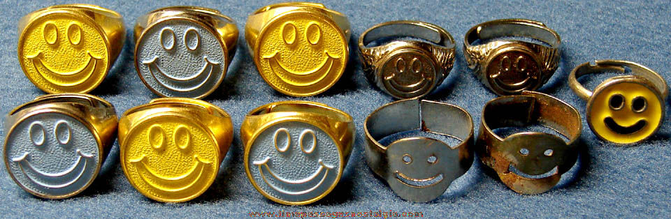 (11) Old Metal Smile Face Gum Ball Machine Prize Toy Rings