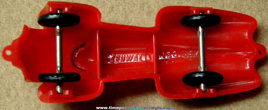 Old Futuristic Looking Red Hard Plastic Renwal Miniature Toy Race Car