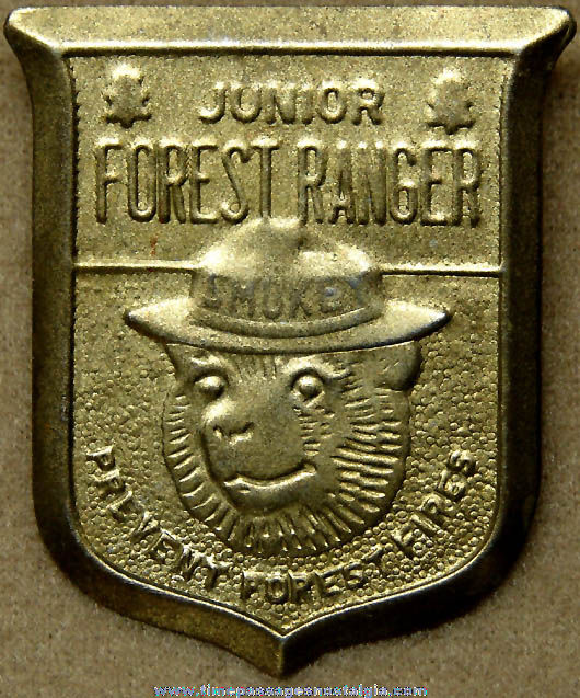 Old Embossed Brass Smokey Bear Junior Forest Ranger Toy Badge