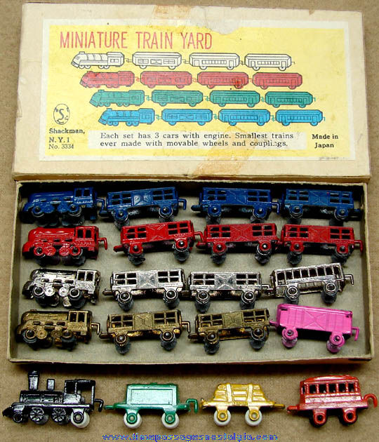 (5) Old Boxed Miniature Painted Metal Shackman Toy Train Sets