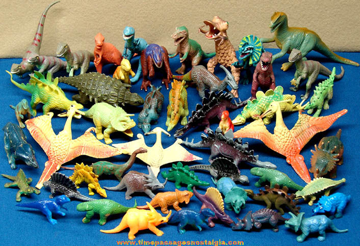 (50) Mixed Painted or Colored Plastic Prehistoric Dinosaur Play Set Figures