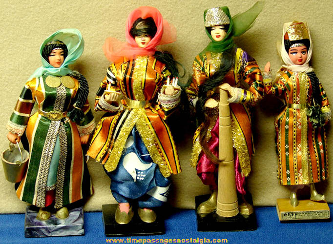 (4) Small Woman Native Costume Toy Dolls on Stands