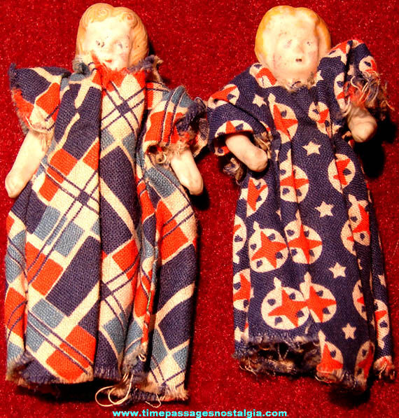 (2) Matching Old Miniature Bisque Porcelain Toy Dolls with Colorful Dresses
