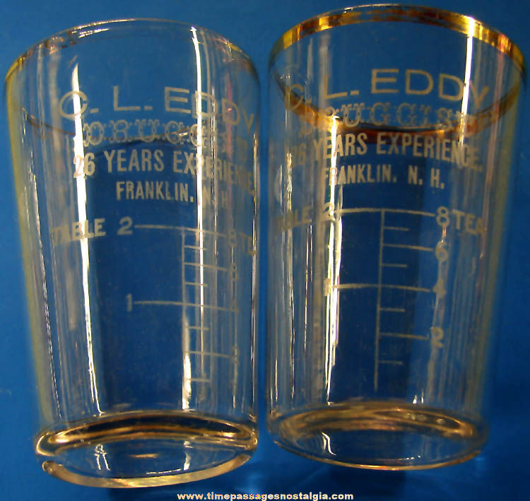 (2) Matching Early Franklin New Hampshire Druggist Advertising Premium Dose Measuring Glasses