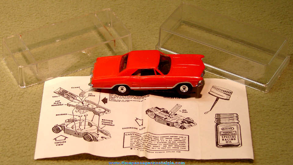 Boxed 1960s Red 1963 Buick Riviera Aurora Slot Car