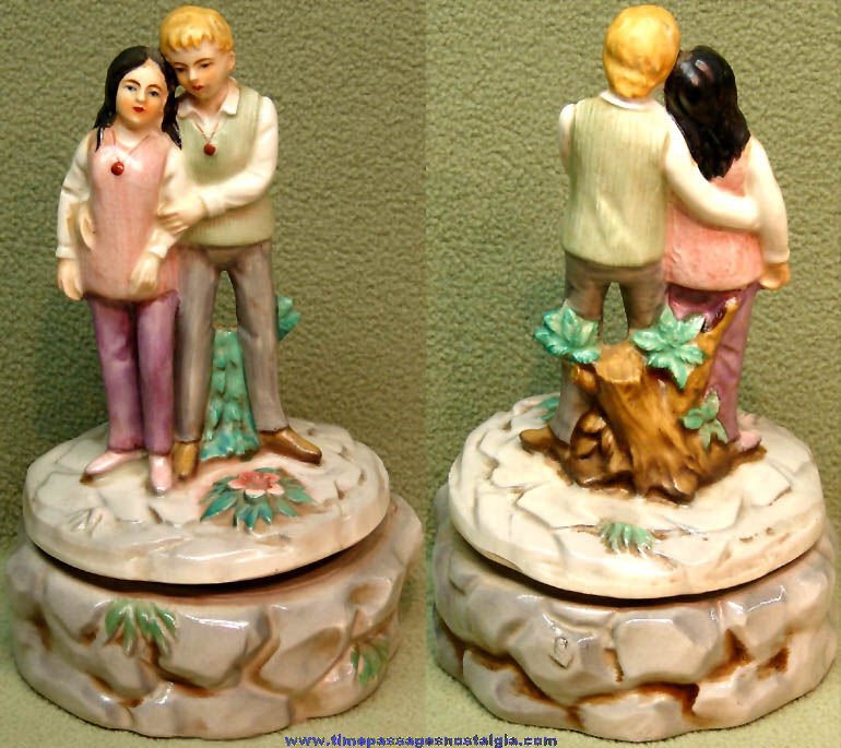 Colorful 1970s Love Story Wind Up and Rotating Musical Ceramic Figurine