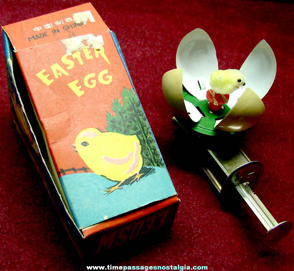 Colorful Old Boxed Easter Egg Mechanical Spinning Novelty Tin Toy